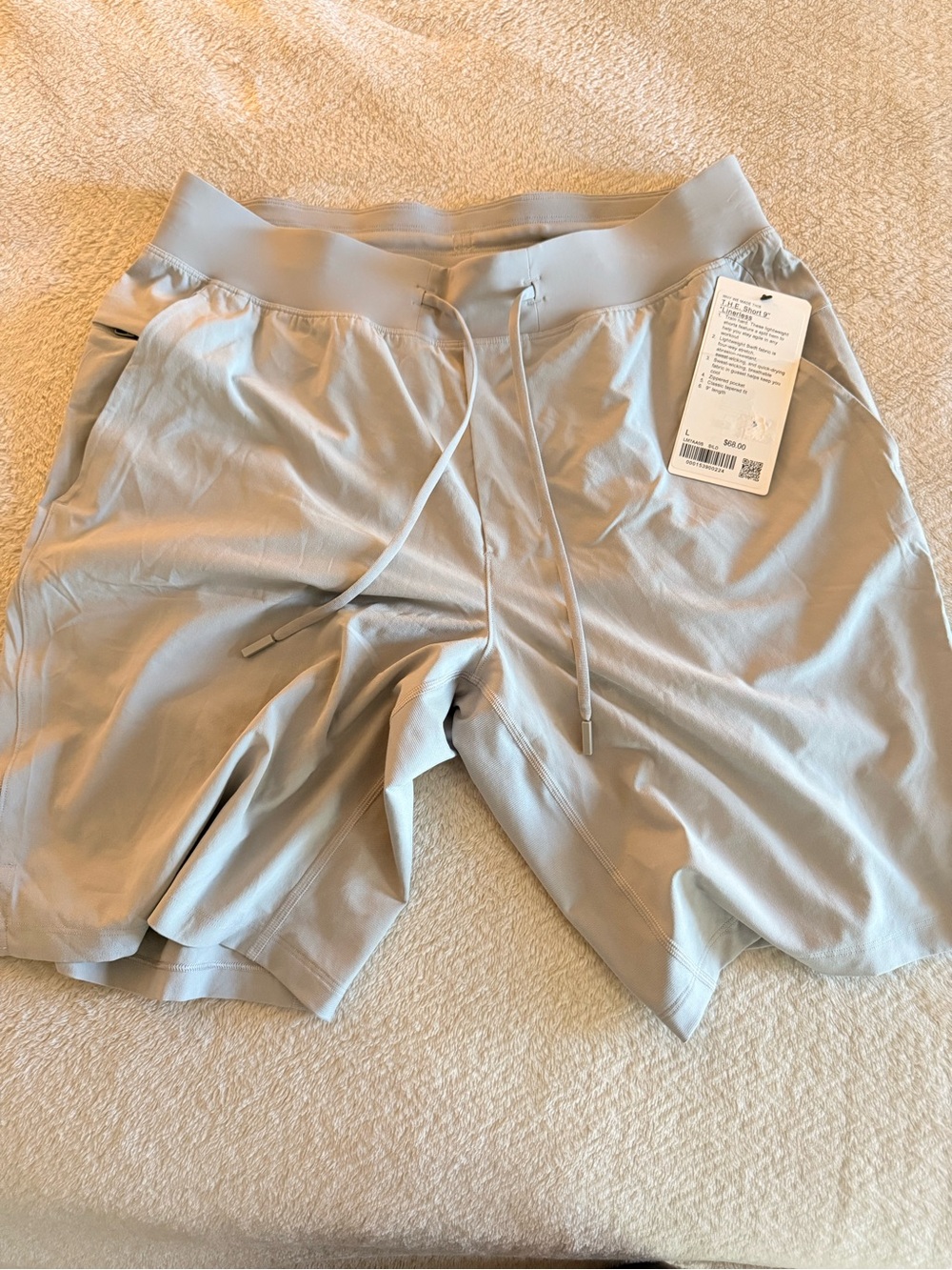 T.H.E. Lululemon 9” short . Silver Gray